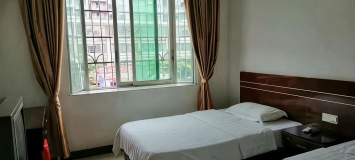 Guangning Wenhua Travel Industry Room Hotel a Guangning