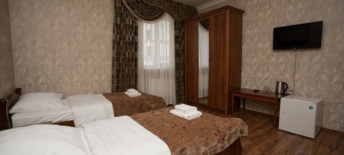 Snezhnaya Koroleva Hotel Hoteles en Dombay