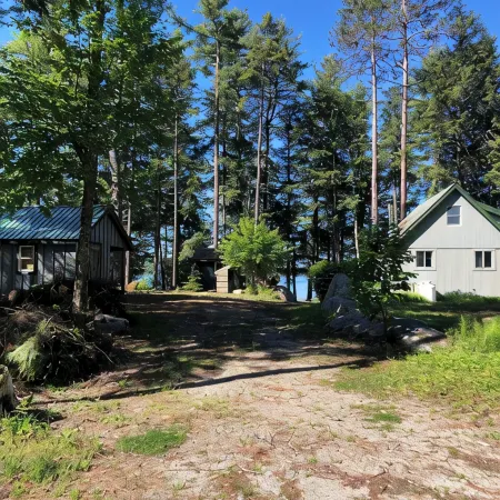 Cozy, Off-Grid Camp on Spectacle Pond w/ private water frontage!