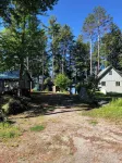 Cozy, Off-Grid Camp on Spectacle Pond w/ private water frontage!