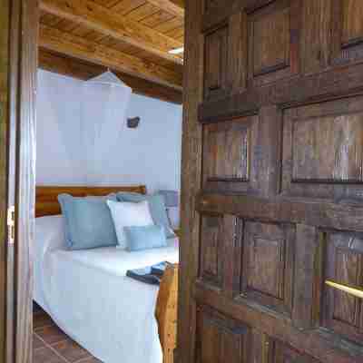 Volcanic lava stone house short walk to the beach, sea and mountain views Rooms