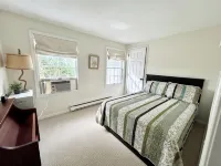 Spacious 5Bdrm Home- Saltwater Pool, WiFi, AC, Private Beach Parking Pass