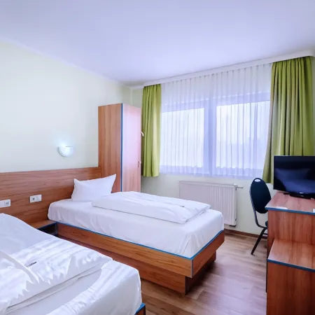Regiohotel Halle Leipzig Airport Отели в г. Шкойдиц