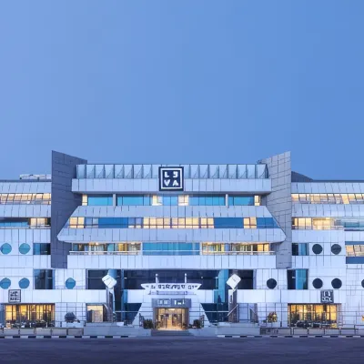 Leva Hotel and Suites, Mazaya Centre Hotels near Green Planet Dubai