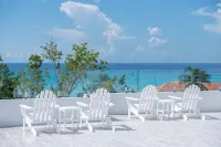 Private 7 Mile Beach Beach Club. Ocean views from Roof Terrace and Pool Pavilion - 4-Star