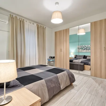 Large apartment between beach and city- With parking and private beach.