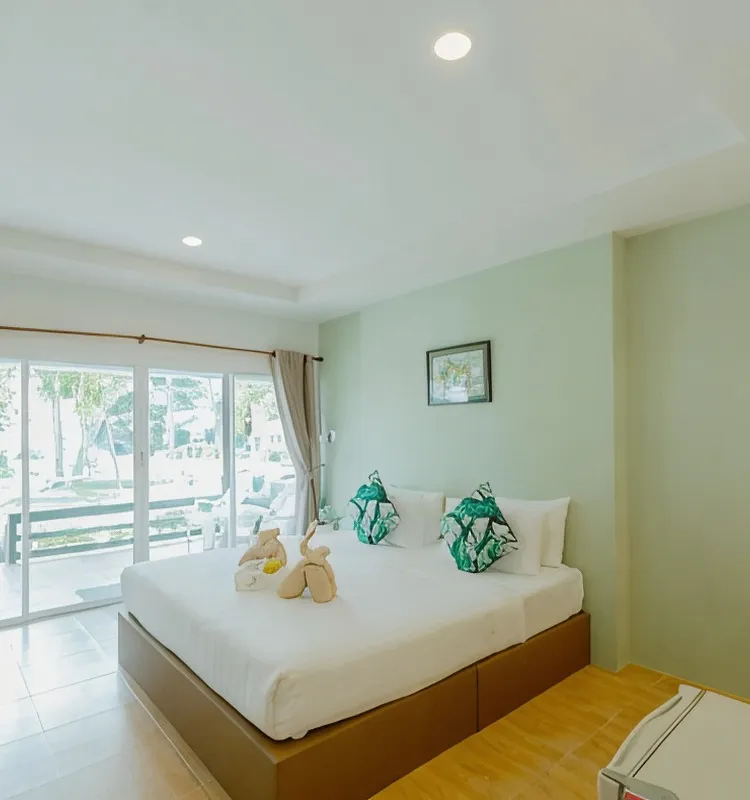 ห้องสวีทวิวสวนและทะเลบางส่วน พร้อมระเบียง 1