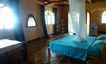 Room in Guest Room - Colobus Suite of 40m2 in Villa 560 m2, View of the Indian Ocean