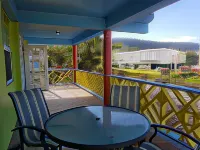 Coco Mango Suites فنادق في Calibishie