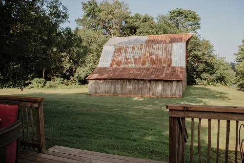 Rustic 1800s' Log Cabin with Modern Amenities on an Old Farm close to Owensboro