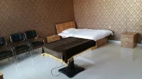 Kulunqi Yuxin Fashion Hotel