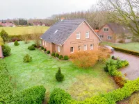 Exclusive vacation home "On the North Sea" グロースハイデのホテル