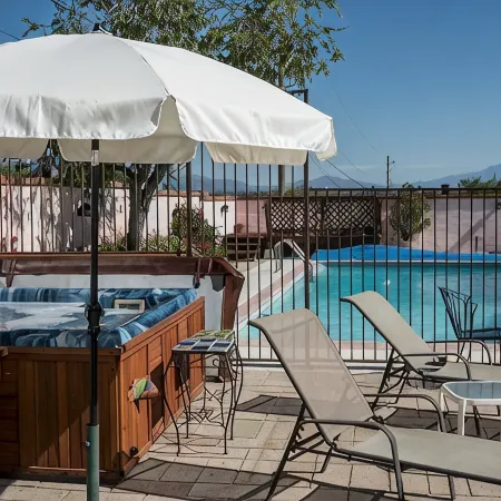 Beautiful home with pool,  private, close to UA & Downtown, arts. Great prices!