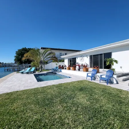 Hidden Gem! Treasure Island Waterfront 2/2 with a pool and dock!
