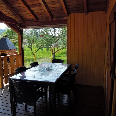 Fenced cottage rental with barbecue and children's play area