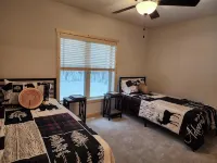 Spacious 5-BR home in Manitowish Waters with pier access on Chain of Lakes.