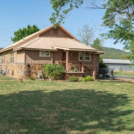 Historic Early Settler Farm House that Has Been Modernized For Your Comfort.