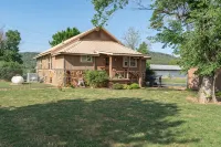 Historic Early Settler Farm House that Has Been Modernized For Your Comfort.