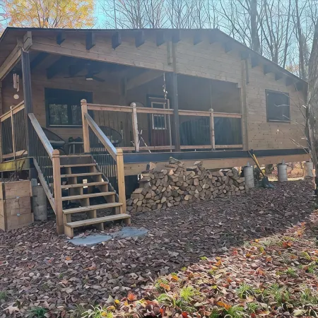 Riverside cabin in the woods