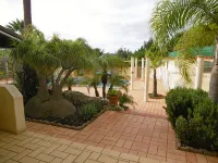 Bungalow with apartment in a quiet location and large pool