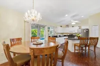 Fenced, private, family friendly villa with exotic poolside views near airport. - Wifi