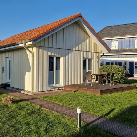 Close to the beach holiday home in a quiet field location with a spacious wooden terrace Отели рядом с достопримечательностью «Рюгенский мост»