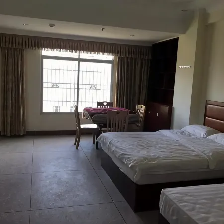 Xinhuang Business Hotel Отели в г. Дапу