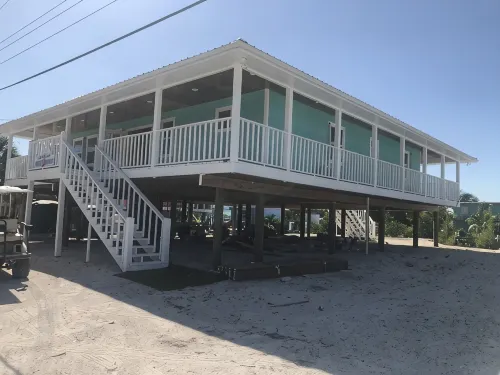 NEW RENTAL!!! Conch Heaven is a four bedroom house on a canal with a dock. - Wi-Fi