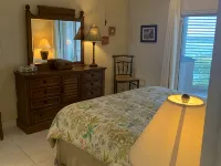 Beachfront Peace!  Awesome top floor condo on Caribbean plus military discount! Hotel a North Side