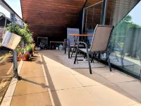 3 stars!!! DG apartment with a covered balcony in a quiet location!