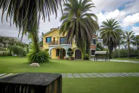 Green Field B&B Hotels in Cloud Landscape