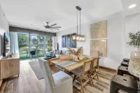 FIRST FLOOR 3/2, GOLF, POOL, TENNIS, BEAUTIFULLY  REMODELED CLOSE TO BEACHES