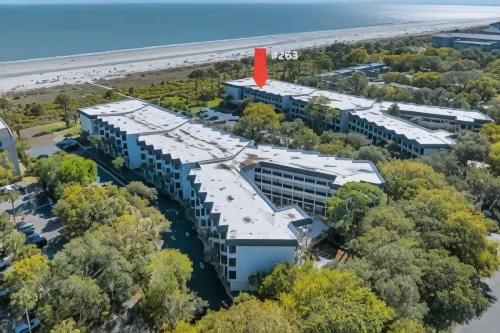 Ocean View Balcony and Community Pool - Charming Island Escape