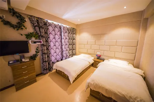 Xichang Qionghai International Apartment Hotel - Kondo