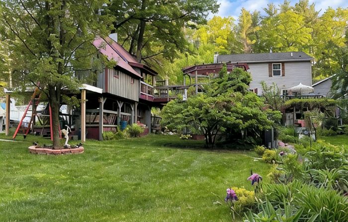 Tree house  lots birds  great location . ..... lots to do all summer long ......