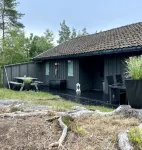 Cozy vacation home in southern Norway (Tromøy, Arendal) with a boat and a pier.