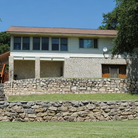 Lake Front property on Inks Lake with beautiful lake views /dock/swimming area.