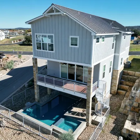 Shenanigans New Large  home steps from the water. Heated Pool hot tub boat slip