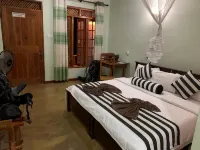 Dinaro Guest