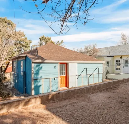 Refined Miner’s Cottage: Fenced Yard, Screened Porch.