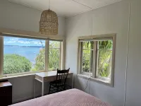 Classic Kiwi Bach In Blissful Urquhart Bay - Relax and Recharge Hotels in 