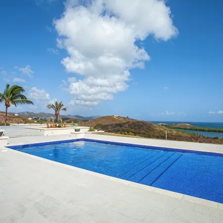 Beautiful 7.7 acre estate with a huge home and stunning views of the Caribbean