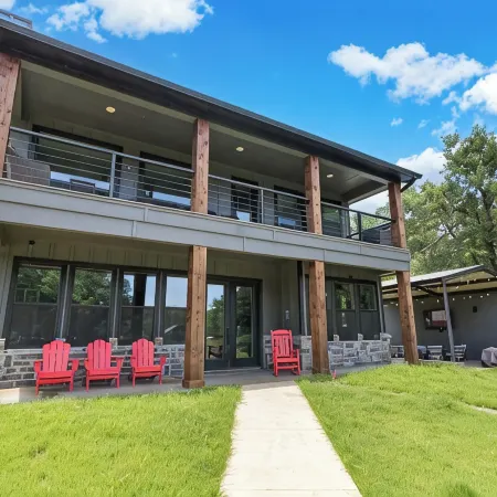 Richland Chambers Lakefront 2-story home with boat dock and pavilions.
