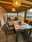 Your mobile home with covered terrace and barbecue is waiting for you this summer.