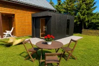 Modern Wood House in Rewal With a Terrace