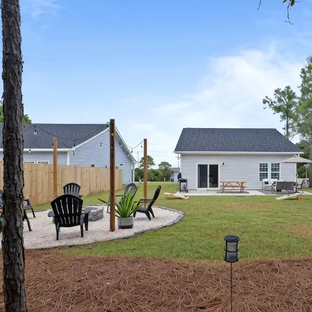Coastal Retreat 10 Minutes to Beach w/ King Bed, Grill, Fire Pit & Game Room