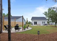 Coastal Retreat 10 Minutes to Beach w/ King Bed, Grill, Fire Pit & Game Room - 4-Star