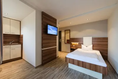 Central Hotel-Apart München Отели в г. Берг ам Лайм