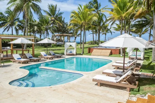 Award-Winning Beachfront VillaSleeps 28  • Full Staff • Pool Spa Private Beach