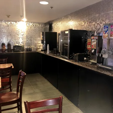 Delavan Inn and Suites Отели в г. Делаван